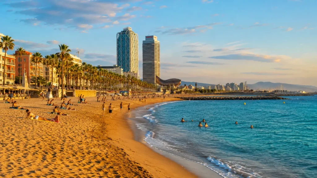 Barceloneta beach with skyline view, a relaxing stop on a barcelona itinerary 5 days plan