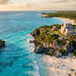 Turquoise coastline showing the best time to visit Tulum with clear skies and Maya ruins