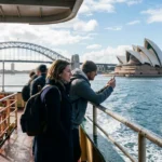 Sydney Opera House and Harbour Bridge seen from a ferry, one of the best things to do in Sydney Australia