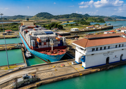 Cargo ship passing through Panama Canal locks