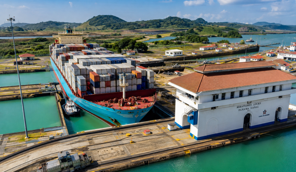 Cargo ship passing through Panama Canal locks