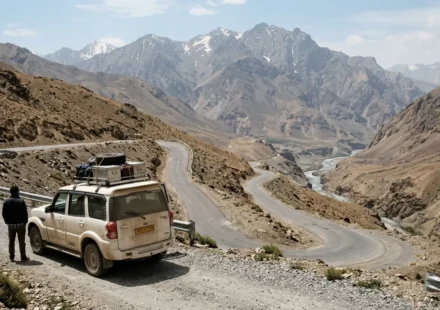 SUV driving a mountain highway on one of the best road trips in India